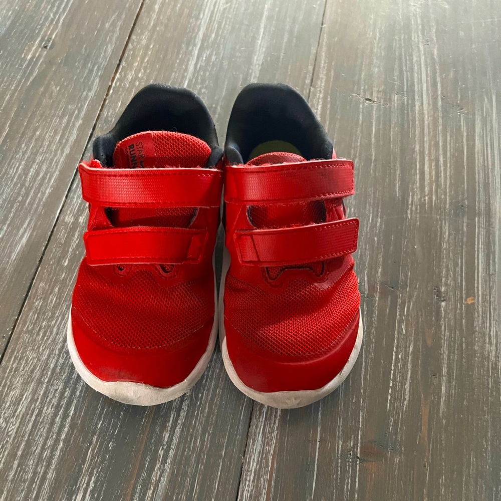 Kids Nike red shoes